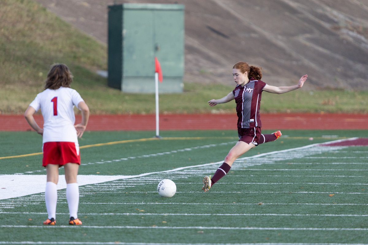 Soccer player taking a corner kick